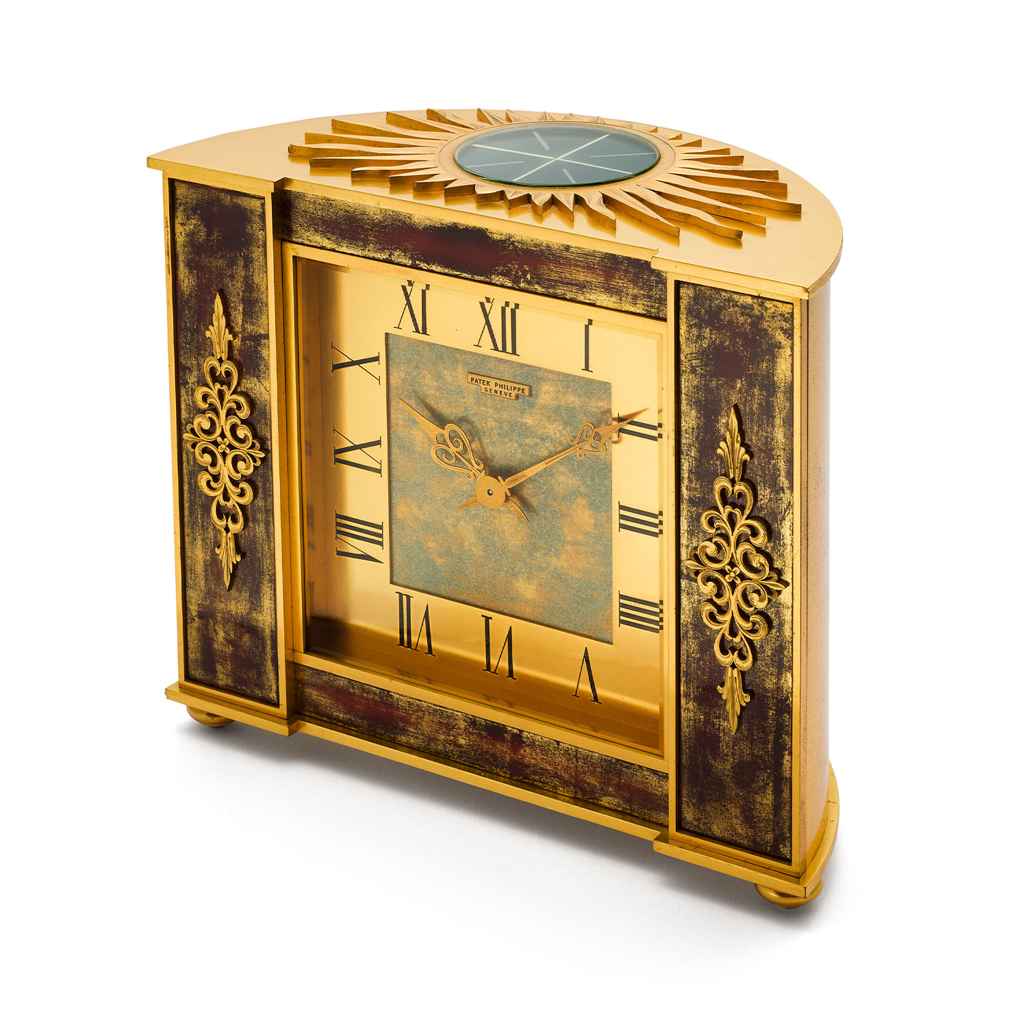 PATEK PHILIPPE GILDED BRASS AND RED LACQUER DESK CLOCK, REF. 801