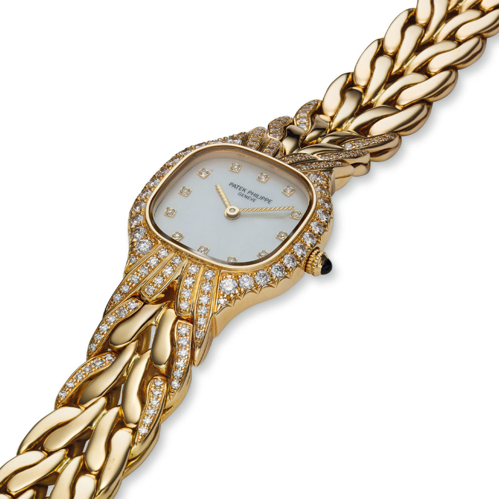 PATEK PHILIPPE YELLOW GOLD AND DIAMOND LADIES 'LA FLAMME' BRACELET WATCH REF. 4815/3J