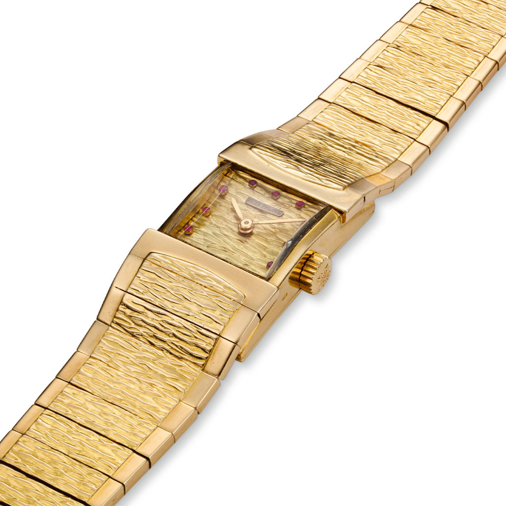 PATEK PHILIPPE GOLD AND RUBY, REF. 3409J