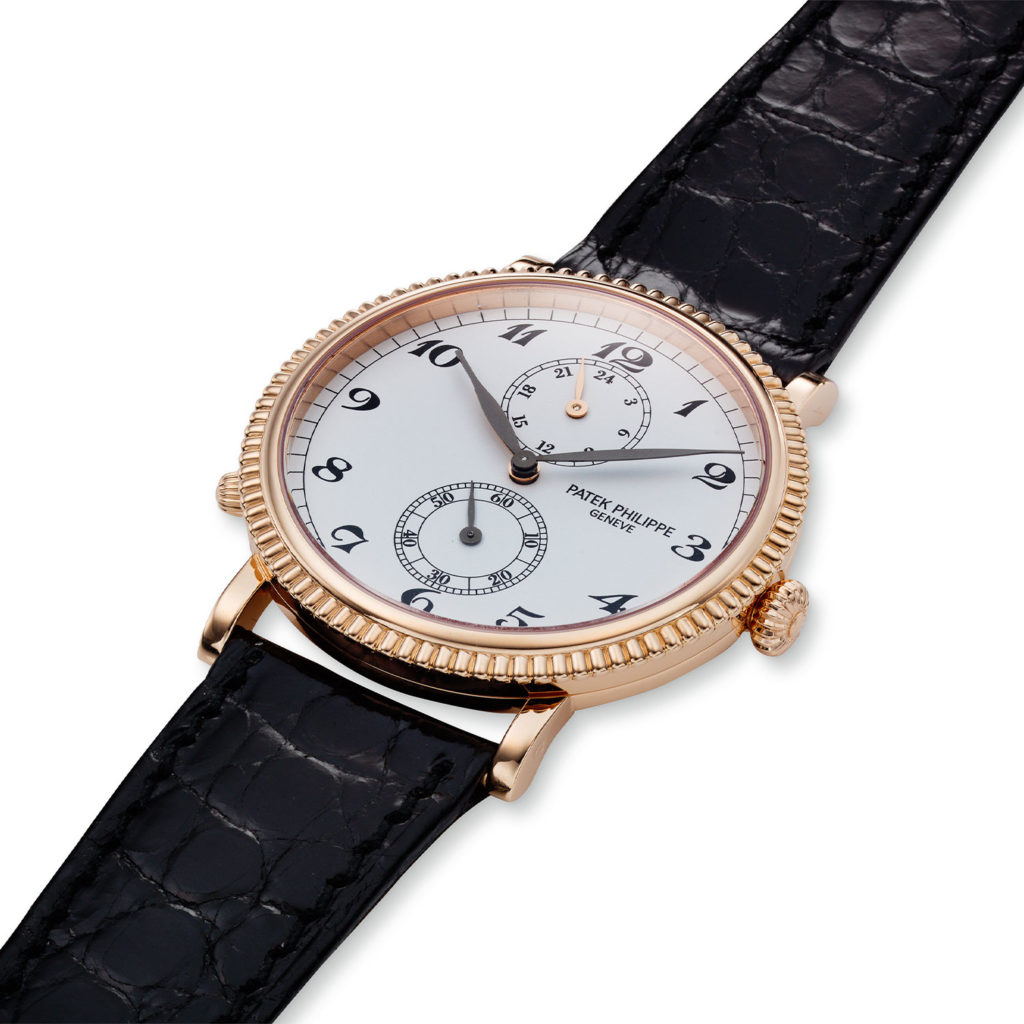 PATEK PHILIPPE ROSE GOLD TRAVEL TIME REF. 5034R