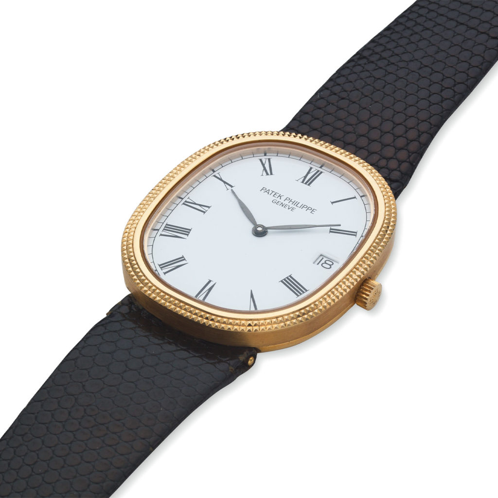 PATEK PHILIPPE YELLOW GOLD HOBNAIL QUARTZ ELLIPSE,  REF. 3931J