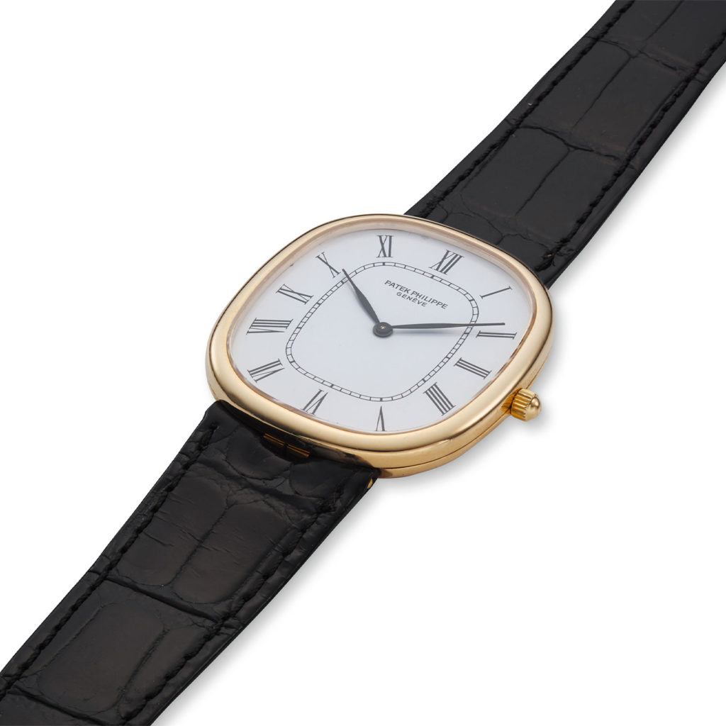 PATEK PHILIPPE YELLOW GOLD ELLIPSE WITH WHITE ROMAN DIAL, REF. 3738
