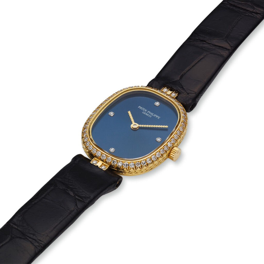 PATEK PHILIPPE YELLOW GOLD AND DIAMOND LADIES ELLIPSE REF. 4698J