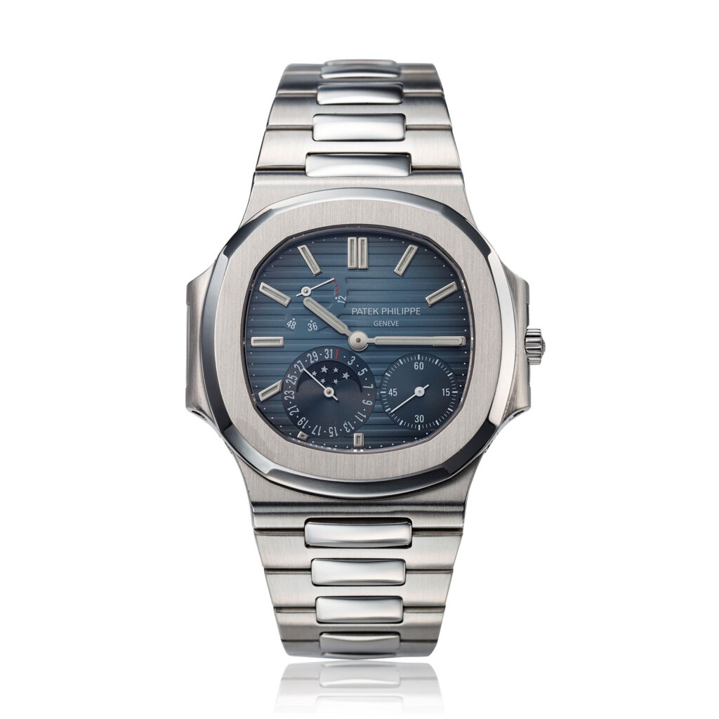 PATEK PHILIPPE STEEL NAUTILUS WITH MOON PHASE AND POWER RESERVE, REF. 3712/1A