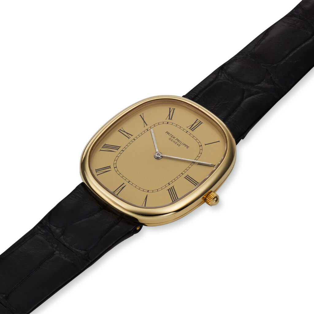PATEK PHILIPPE ELLIPSE WRISTWATCH WITH GILT DIAL, REF. 3738/100J