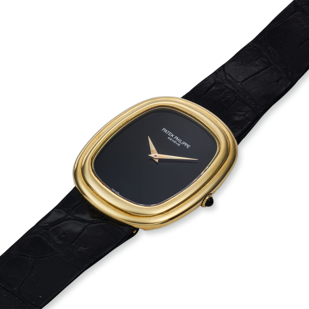 PATEK PHILIPPE YELLOW GOLD AND ONYX REF. 3730J 'ELLIPSE’
