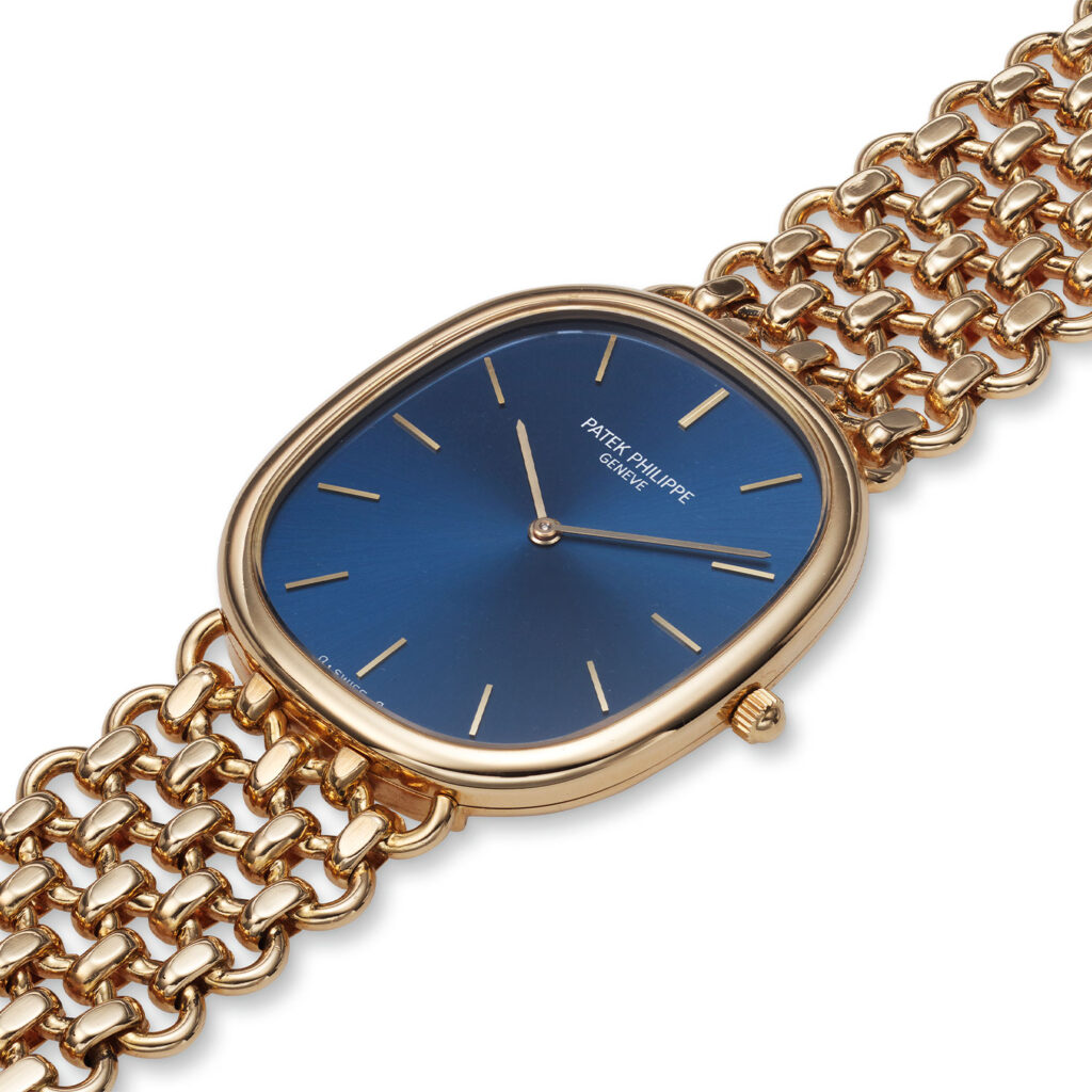 PATEK PHILIPPE YELLOW GOLD ELLIPSE BRACELET WATCH WITH BOX AND PAPERS