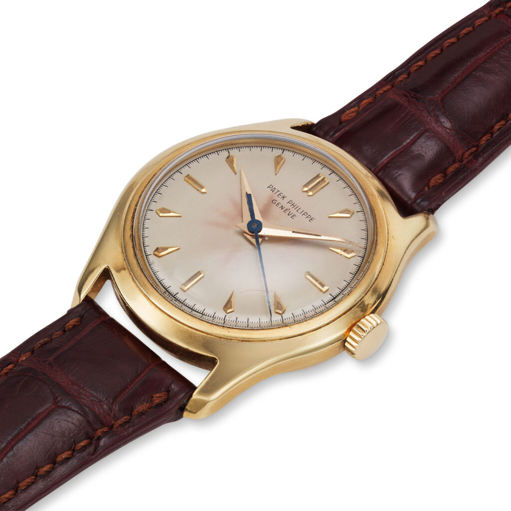 PATEK PHILIPPE YELLOW GOLD SCREW-BACK REF. 2533J