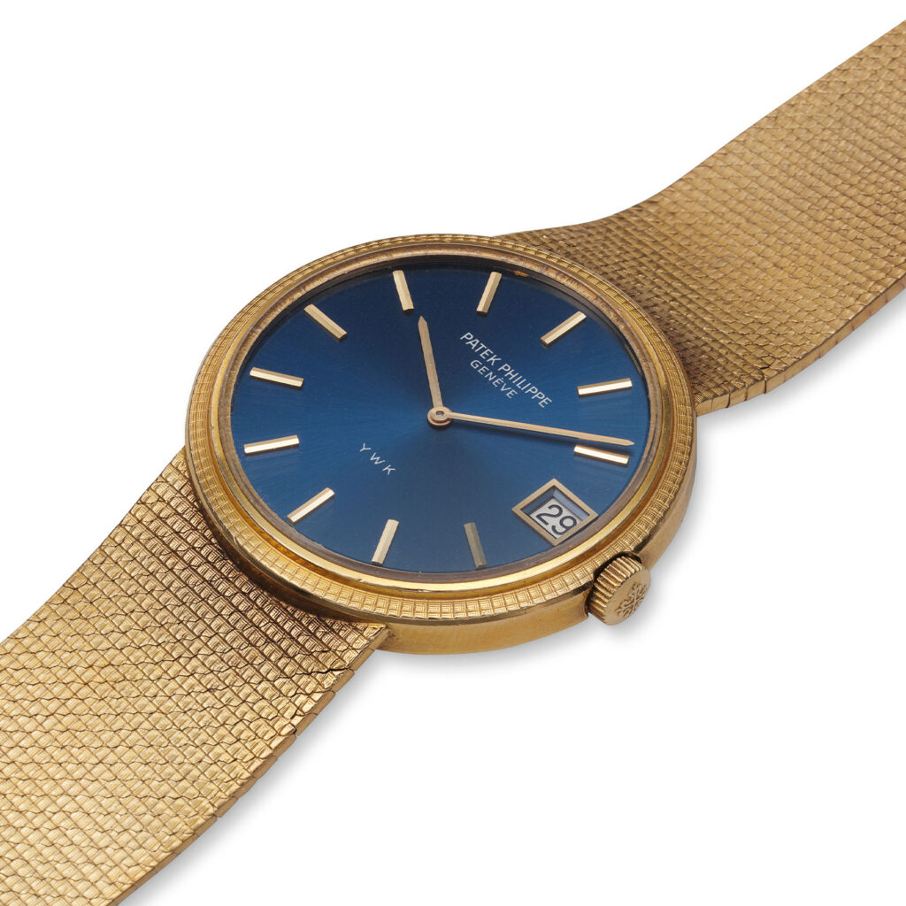 PATEK PHILIPPE SELF-WINDING YELLOW GOLD HOBNAIL BEZEL BRACELET WATCH REF. 3601/3J