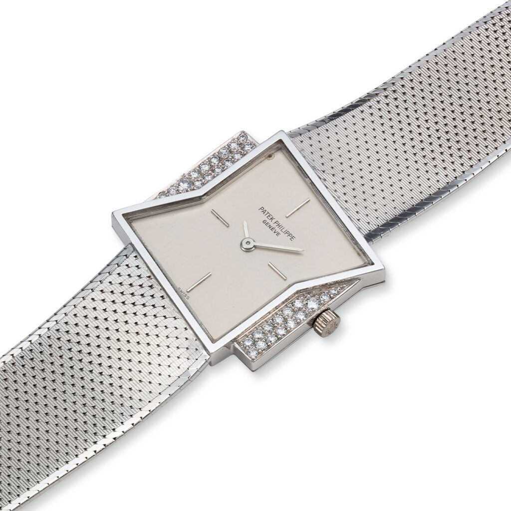 PATEK PHILIPPE WHITE GOLD AND DIAMOND ASYMMETRICAL BRACELET WATCH REF. 3497/1G