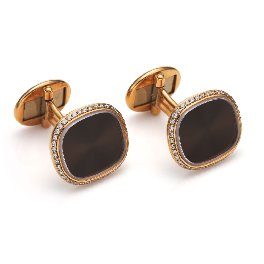 PATEK PHILIPPE ROSE GOLD AND DIAMOND ELLIPSE CUFFLINKS