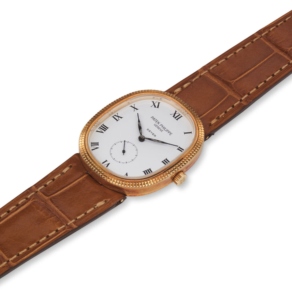 PATEK PHILIPPE YELLOW GOLD HOBNAIL MANUAL ELLIPSE, REF. 3989J