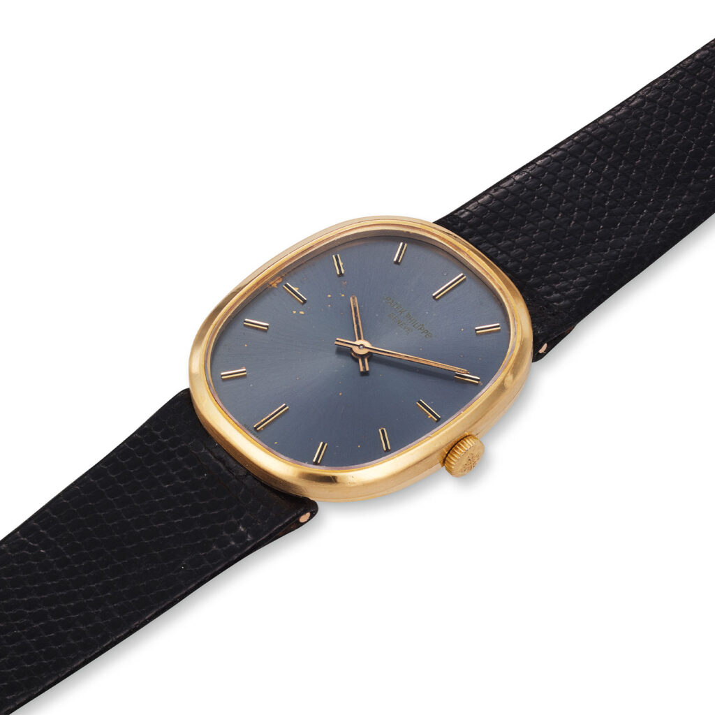 PATEK PHILIPPE YELLOW GOLD ELLIPSE WRISTWATCH WITH ‘ICE BLUE’ DIAL, REF. 3548J