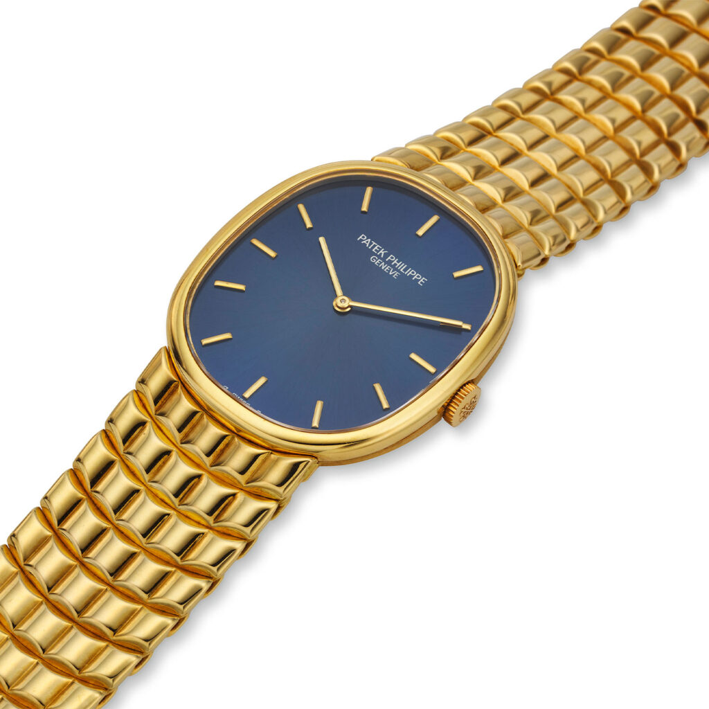 PATEK PHILIPPE YELLOW GOLD ELLIPSE BRACELET WATCH WITH BLUE DIAL, REF. 3848/15J