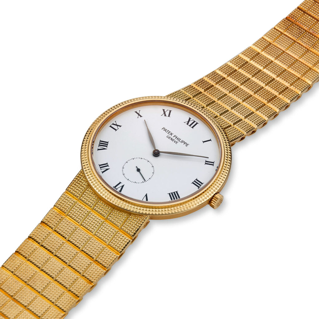 PATEK PHILIPPE YELLOW GOLD MANUAL CALATRAVA BRACELET WATCH, REF. 3919/10J