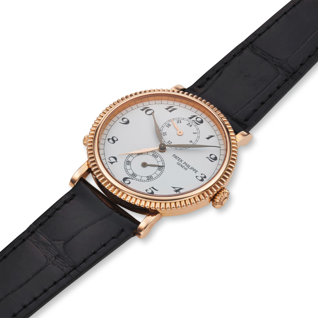 PATEK PHILIPPE ROSE GOLD TRAVEL TIME REF. 5034R