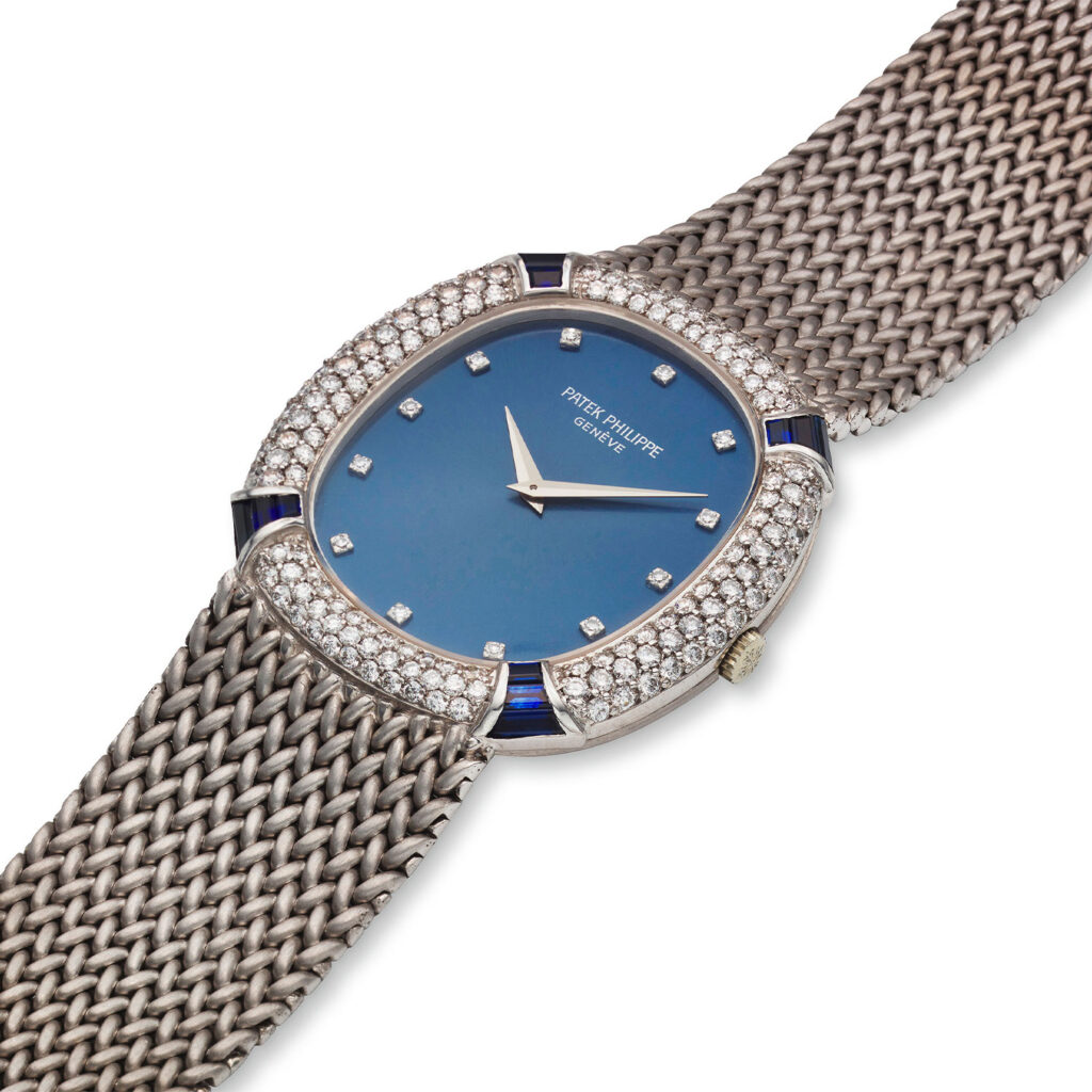 PATEK PHILIPPE WHITE GOLD, DIAMOND AND SAPPHIRE ELLIPSE BRACELET WATCH