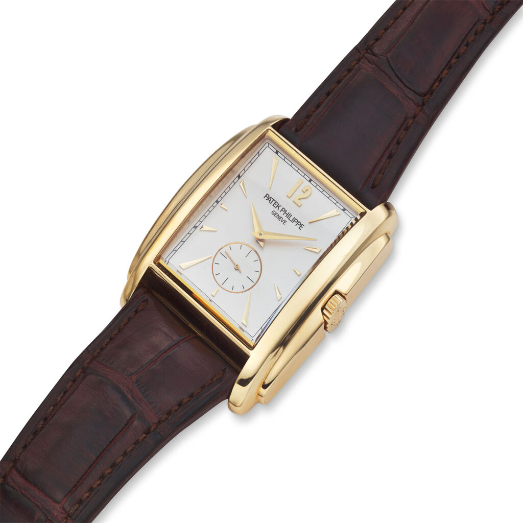 PATEK PHILIPPE YELLOW GOLD GONDOLO WITH SILVERED DIAL REF. 5124J