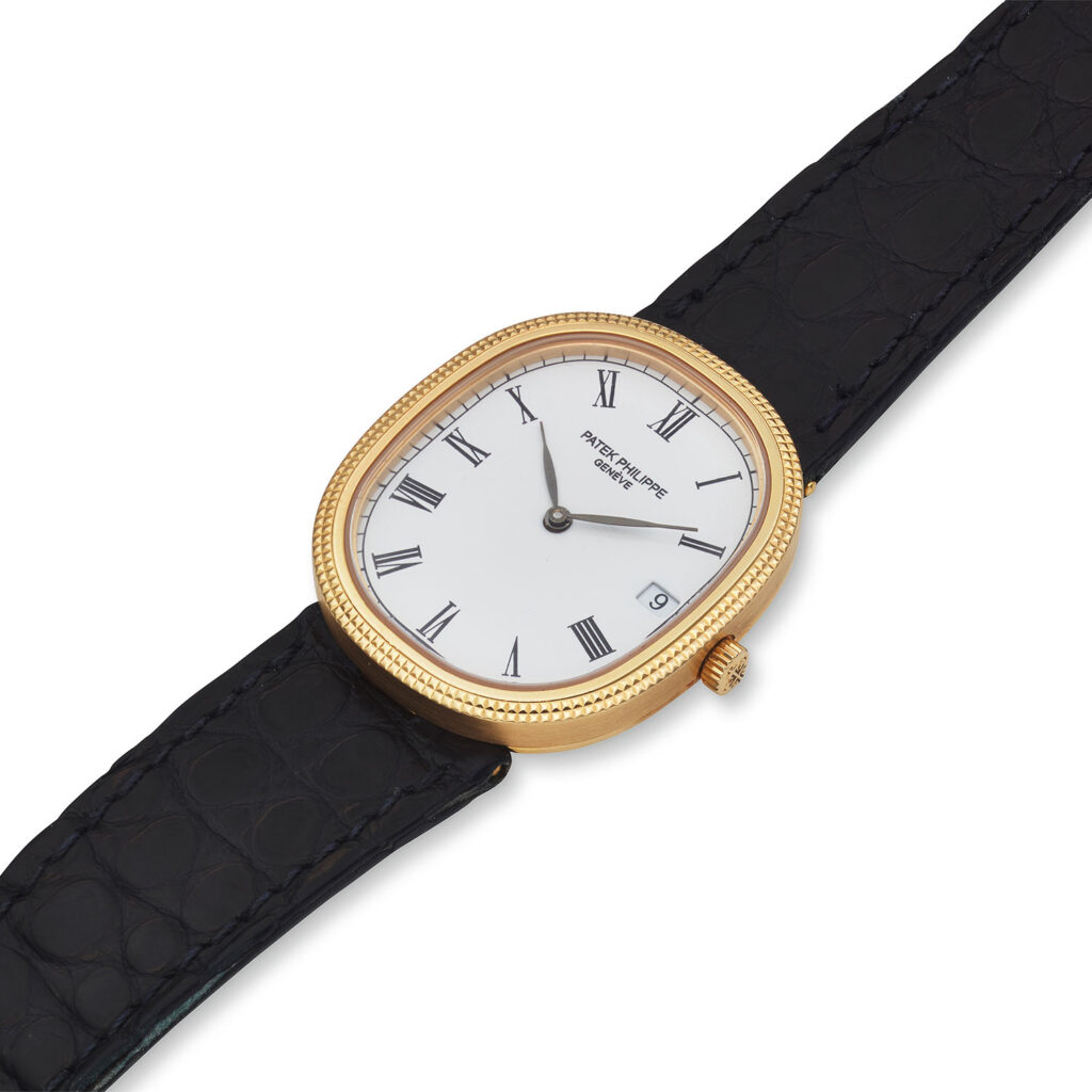 PATEK PHILIPPE YELLOW GOLD HOBNAIL QUARTZ ELLIPSE, REF. 3931J