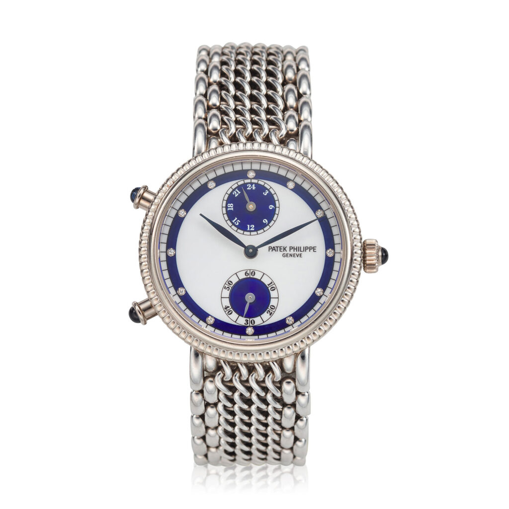 PATEK PHILIPPE WHITE GOLD TRAVEL TIME BRACELET WATCH REF. 4864/2G-001