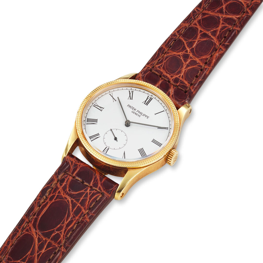 PATEK PHILIPPE YELLOW GOLD HOBNAIL CALATRAVA WRISTWATCH REF. 3796DJ