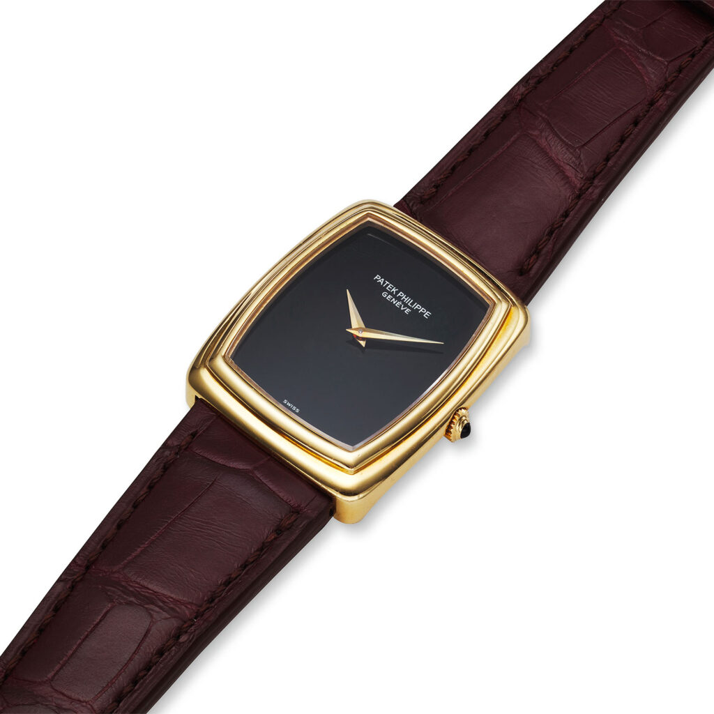 PATEK PHILIPPE YELLOW GOLD AND ONYX REF. 3732J
