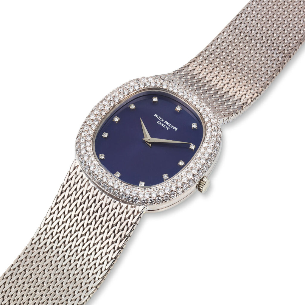 PATEK PHILIPPE WHITE GOLD AND DIAMOND ELLIPSE BRACELET WATCH