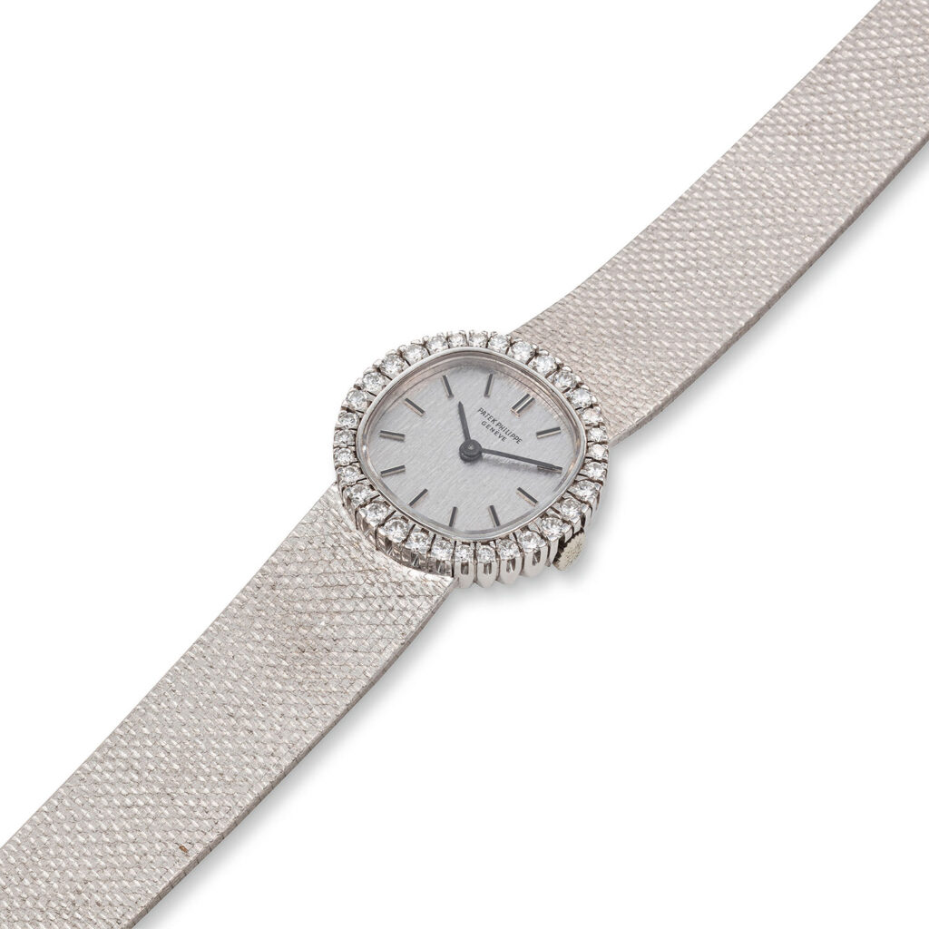 PATEK PHILIPPE WHITE GOLD AND DIAMOND LADIES’ BRACELET WATCH REF. 4113/1G