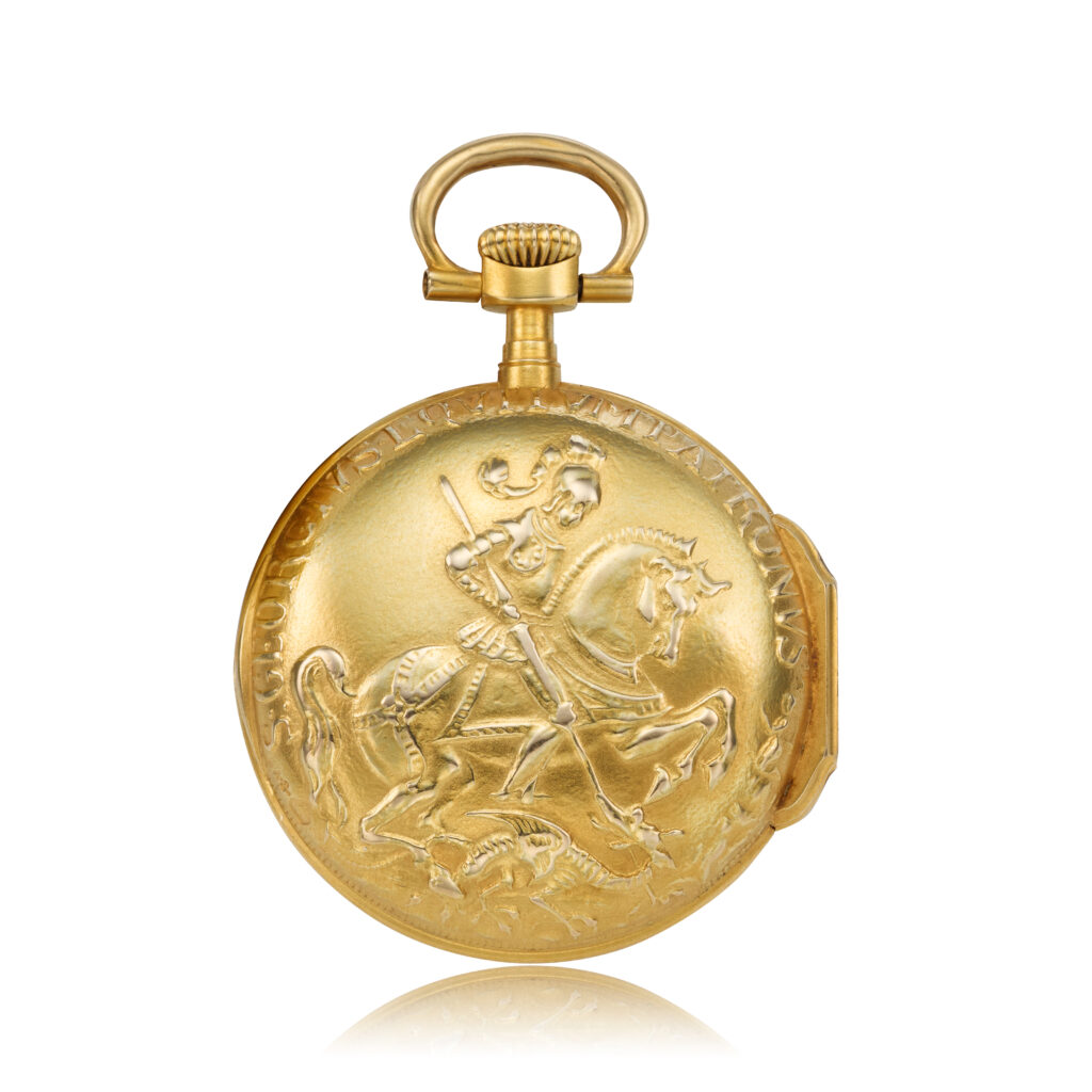 A MINIATURE PHILIPPE GOLD AND ENAMEL 'ST. GEORGE' WATCH