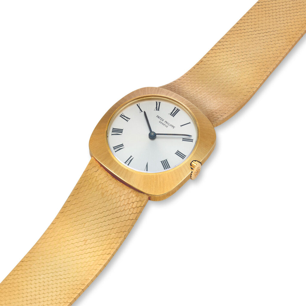 PATEK PHILIPPE YELLOW GOLD CUSHION BRACELET WATCH REF. 3543/2J