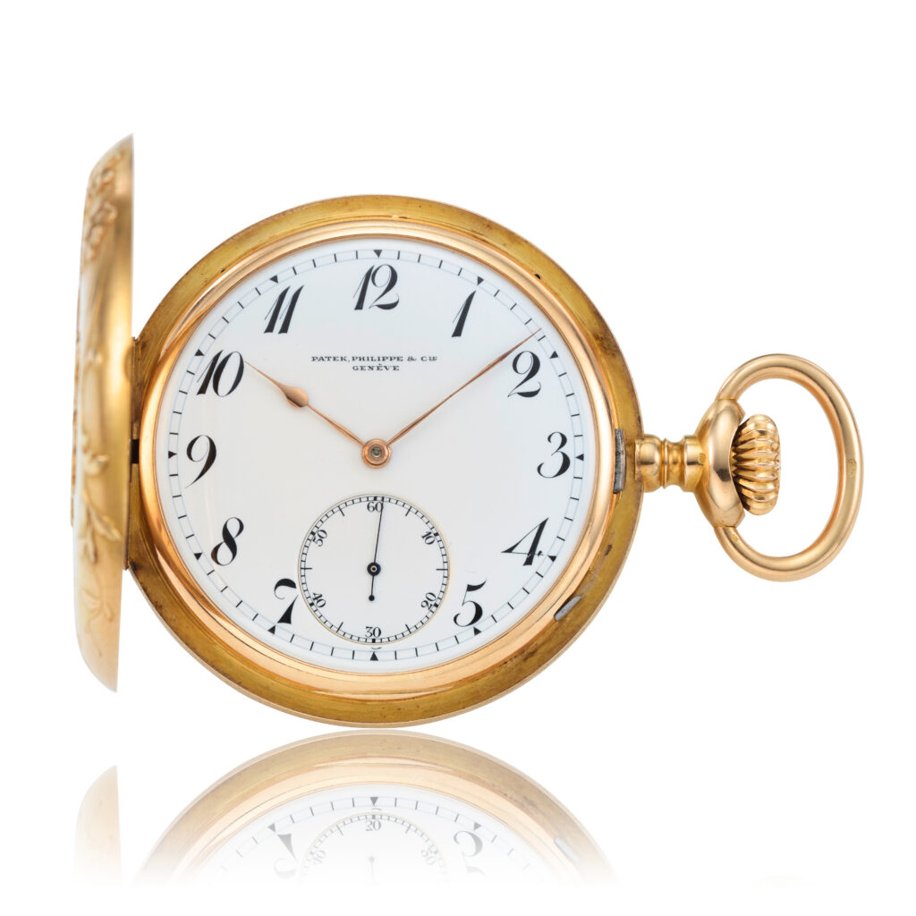 PATEK PHILIPPE YELLOW GOLD HUNTING CASED POCKET WATCH WITH EQUESTRIAN ENGRAVING
